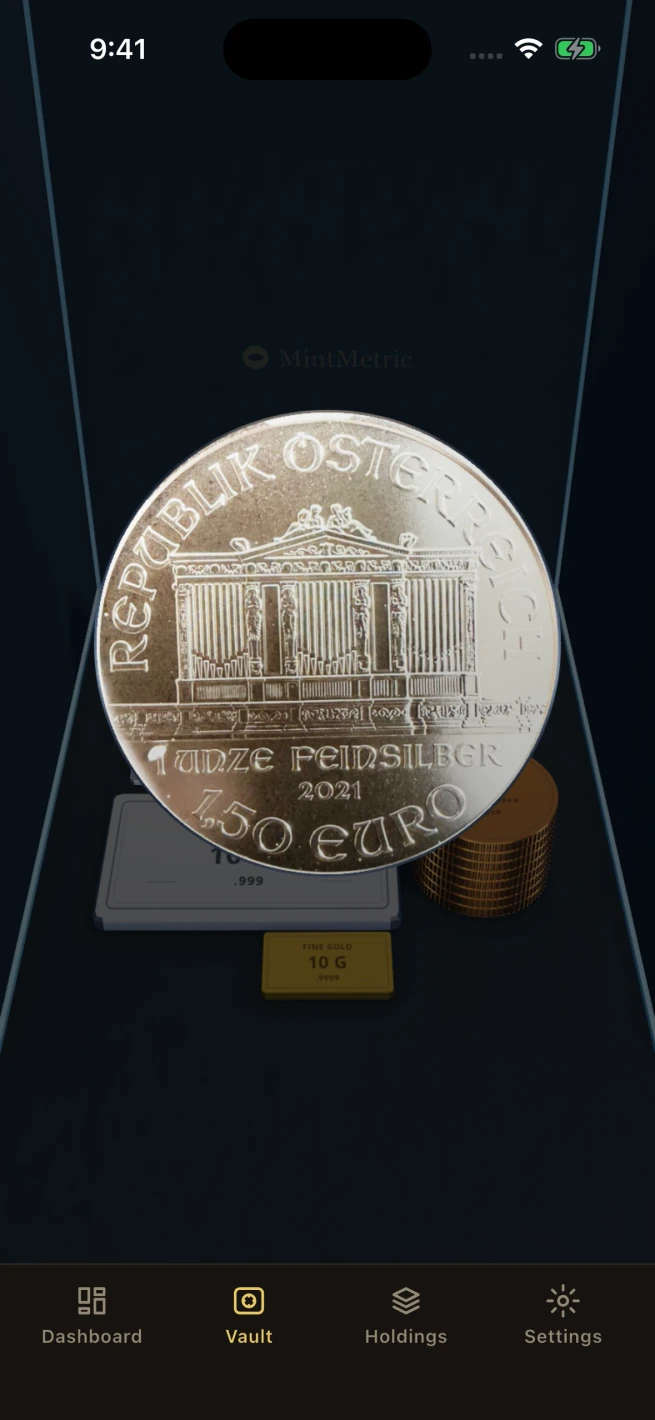 The Vault on an iPhone inspecting one piece: the 2021 silver Philharmonic held up close, showing the owner's photo of its face, with the room dimmed behind it.